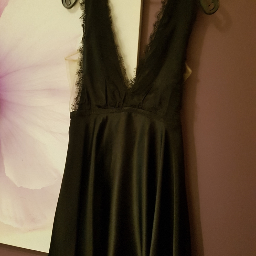 Sexy Bebe S black satin finish short cocktail dress. Worn once.